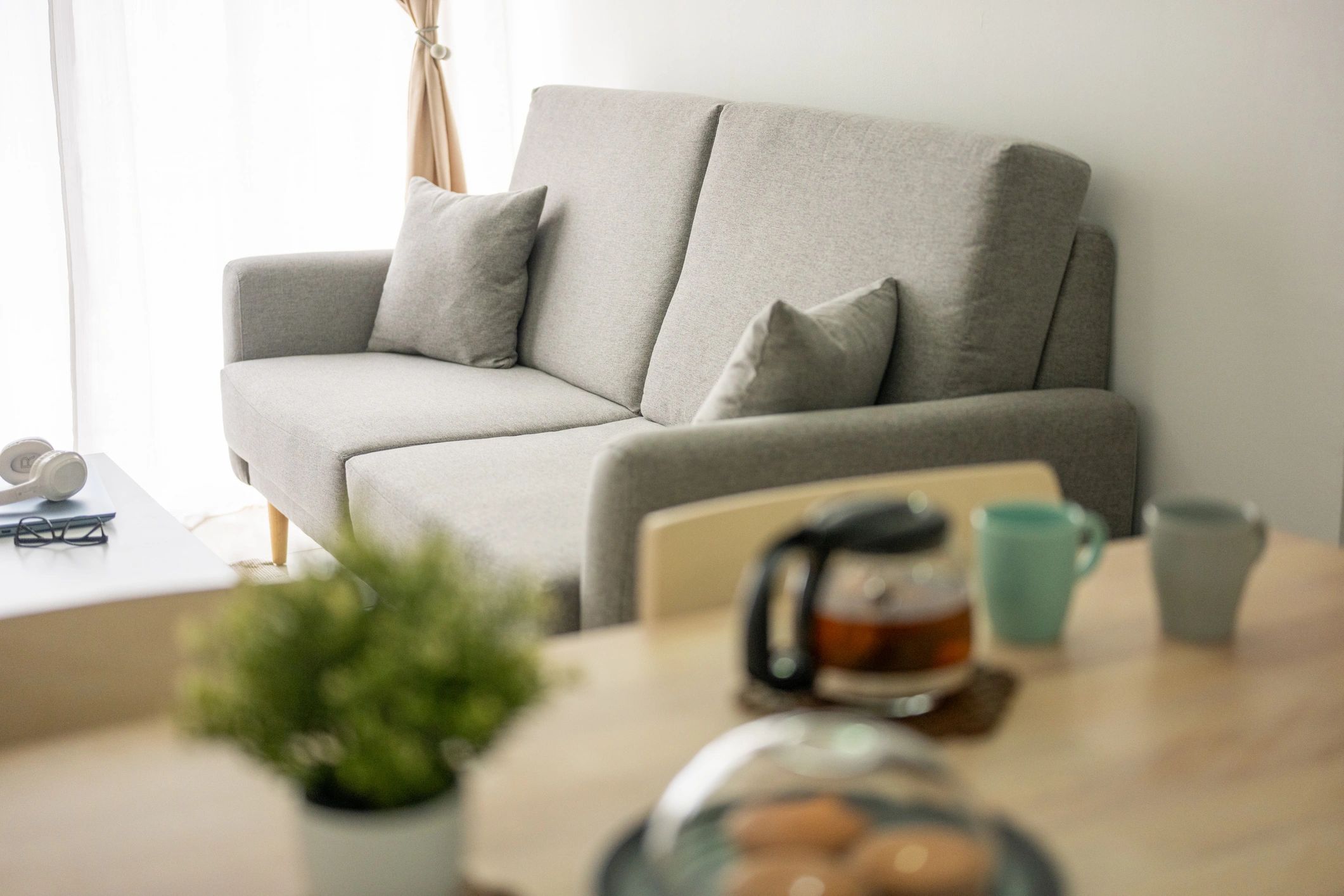 Stylish neutral-toned interior evoking a calm tropical stay
