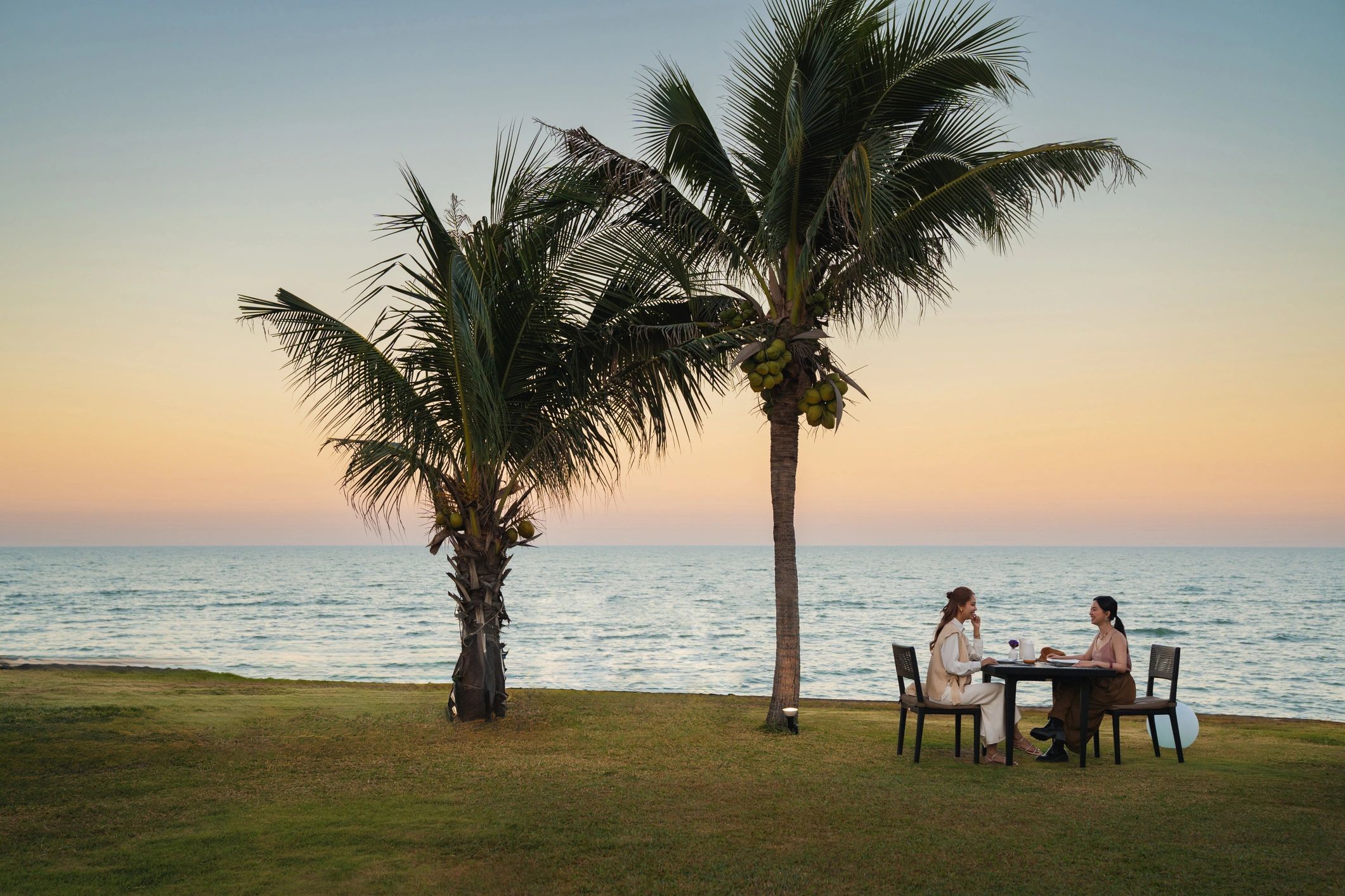 Private seaside dinner at sunset